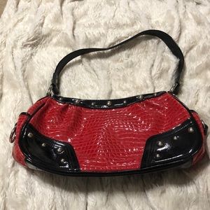 Kathy Van Zeeland red purse